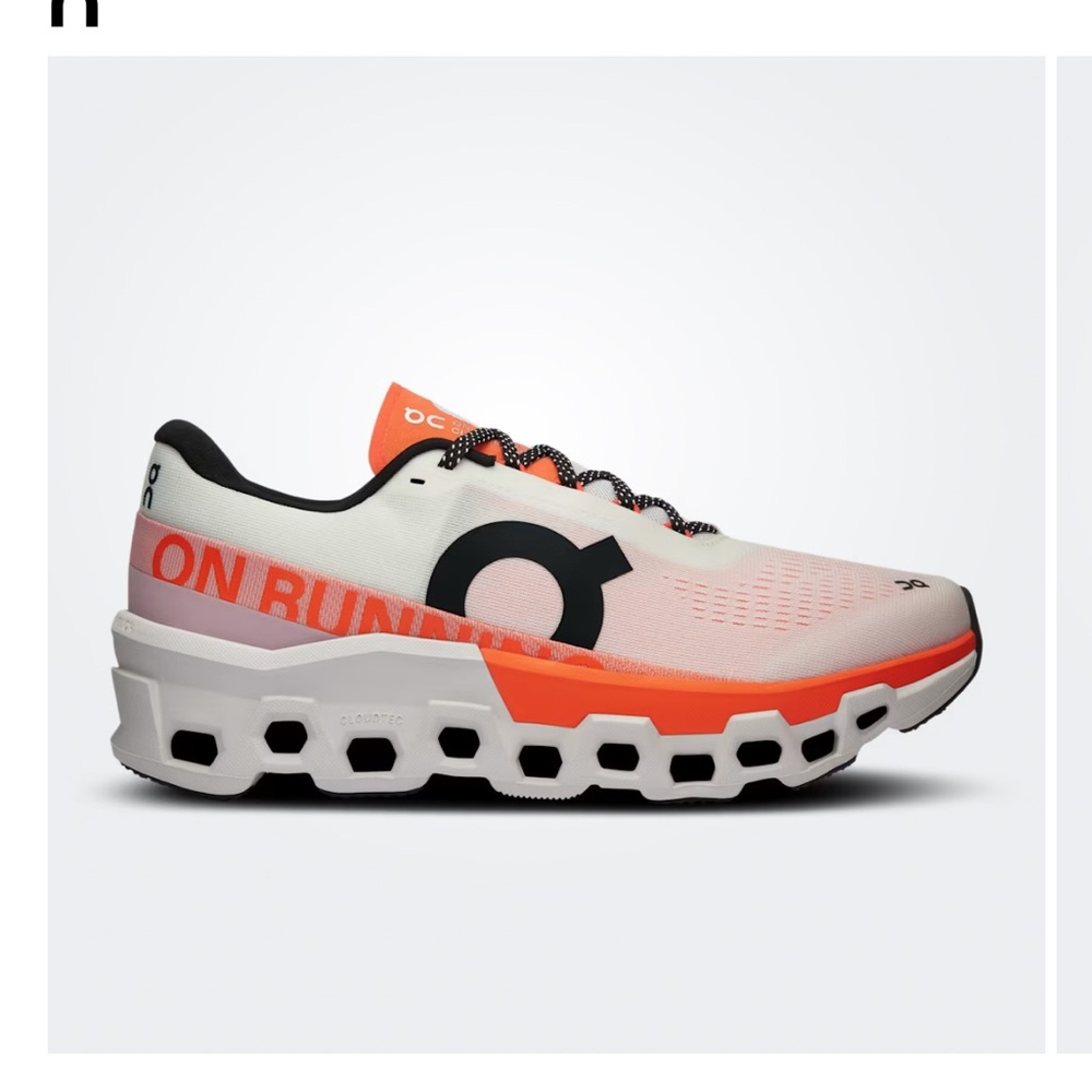 On Running White and Orange Athletic Shoes